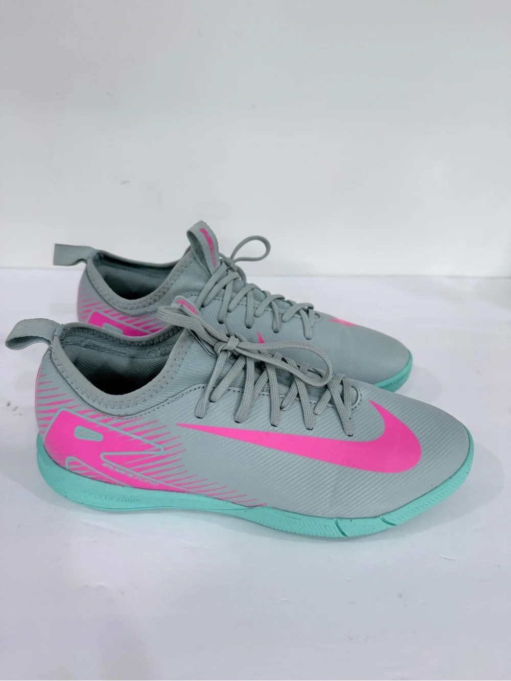 Kids Grey Athletic Shoes with Pink Swoosh and Teal Sole